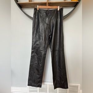 DANIER vintage black leather pants with studded details along sides size 6 small